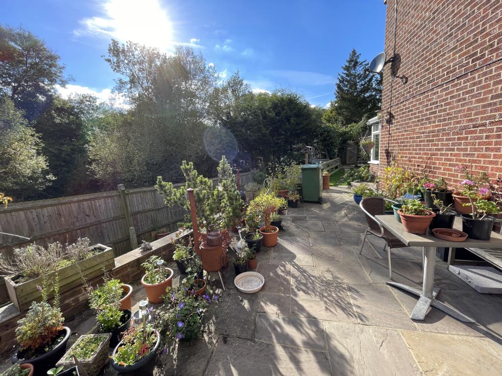 Lot: 190 - RESIDENTIAL PROTECTED TENANCY INVESTMENT - External image of garden from patio area towards rear of property